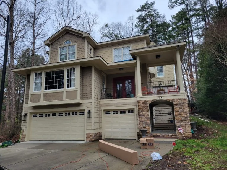 Gutter project on a tan Raleigh home