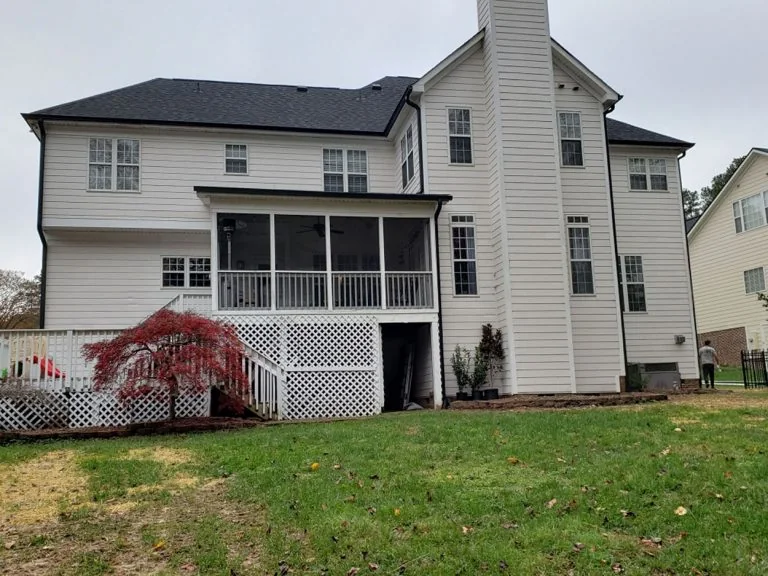Completed dark gutters on the rear of a two-story home